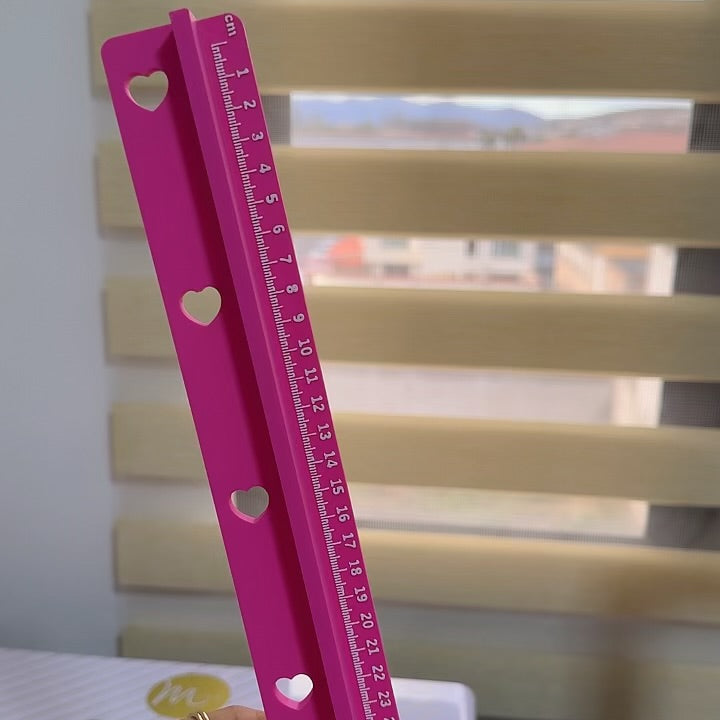Regla protectora con regla  de 30 cm