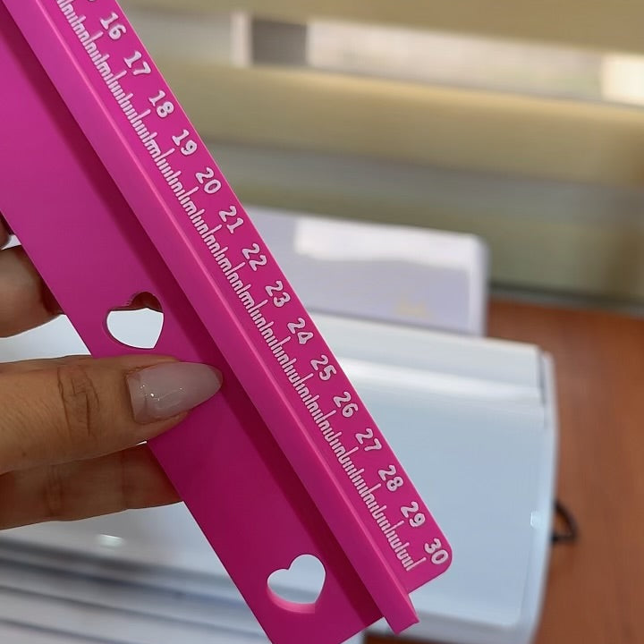 Regla protectora con regla  de 30 cm